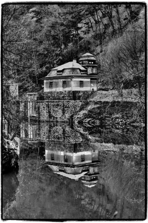 House reflected in water