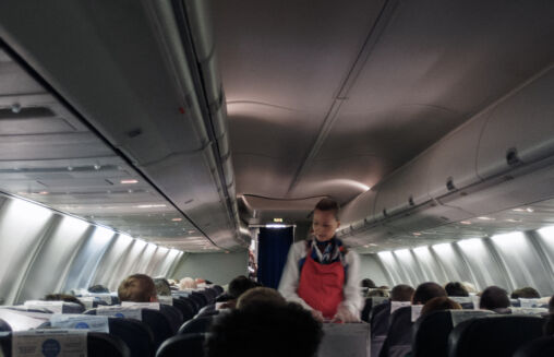 Flight attendant in aircraft