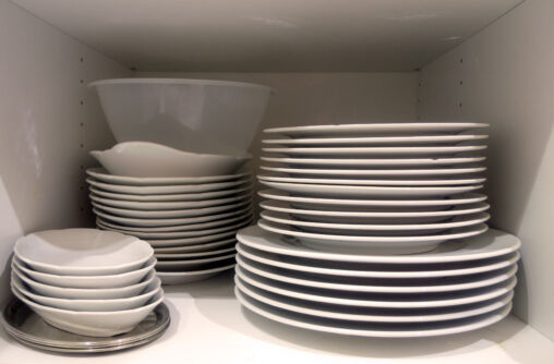 Dishes in cupboard in the kitchen
