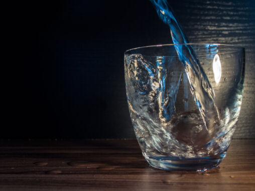 Water is poured into the glass
