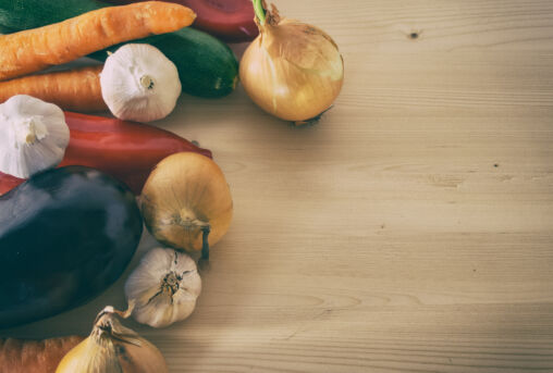 Vegetables on wooden cutting board