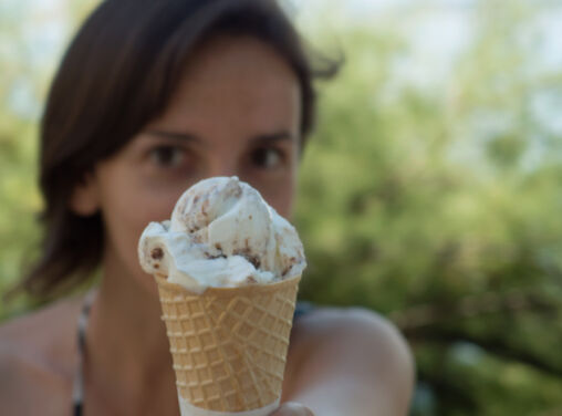 Girl Offering Ice Cream