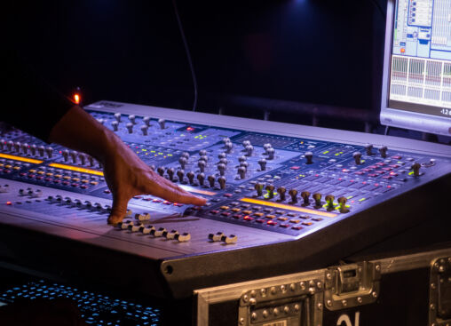 Soundman With a Mixer At Concert