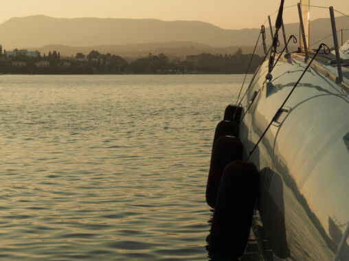 Luxury Catamaran In The Harbor At Sunset