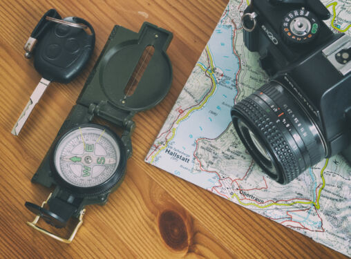Travel Map, Car Key, Compass And Camera