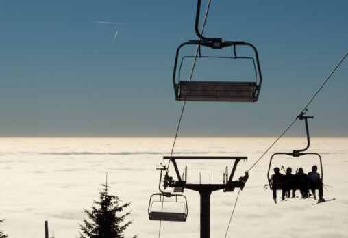 Skiers On A Chairlift