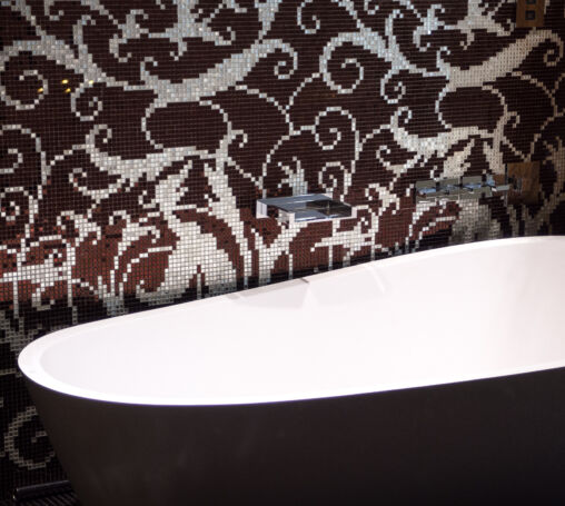 Dark Modern Bathtub In The Bathroom