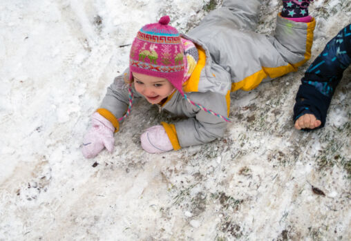 Children Playing On The Snow