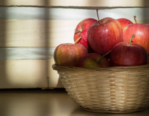 Red Apples In A Wicker Basket