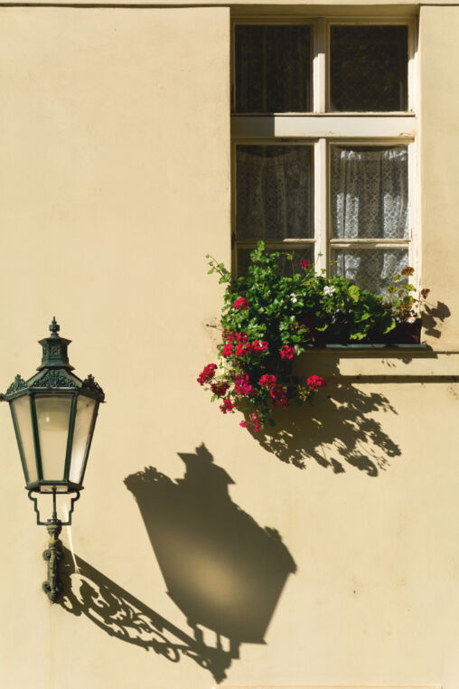 Prague street lamp and window with flowers