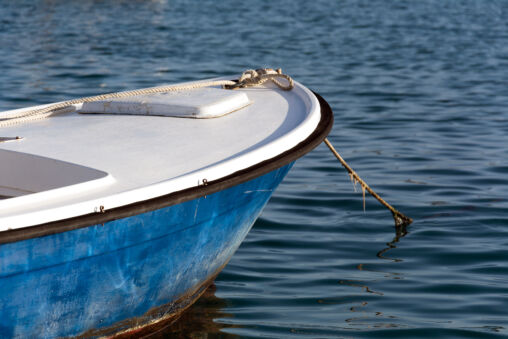 small blue sea dinghy