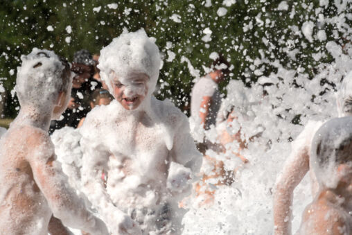 Children have fun in foam