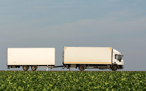 A white Truck with Trailer