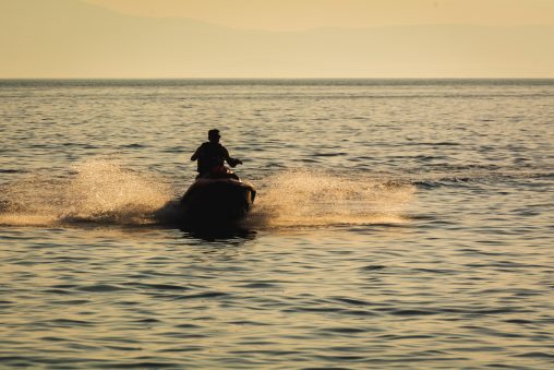 Jet Ski on the Sea at Sunset